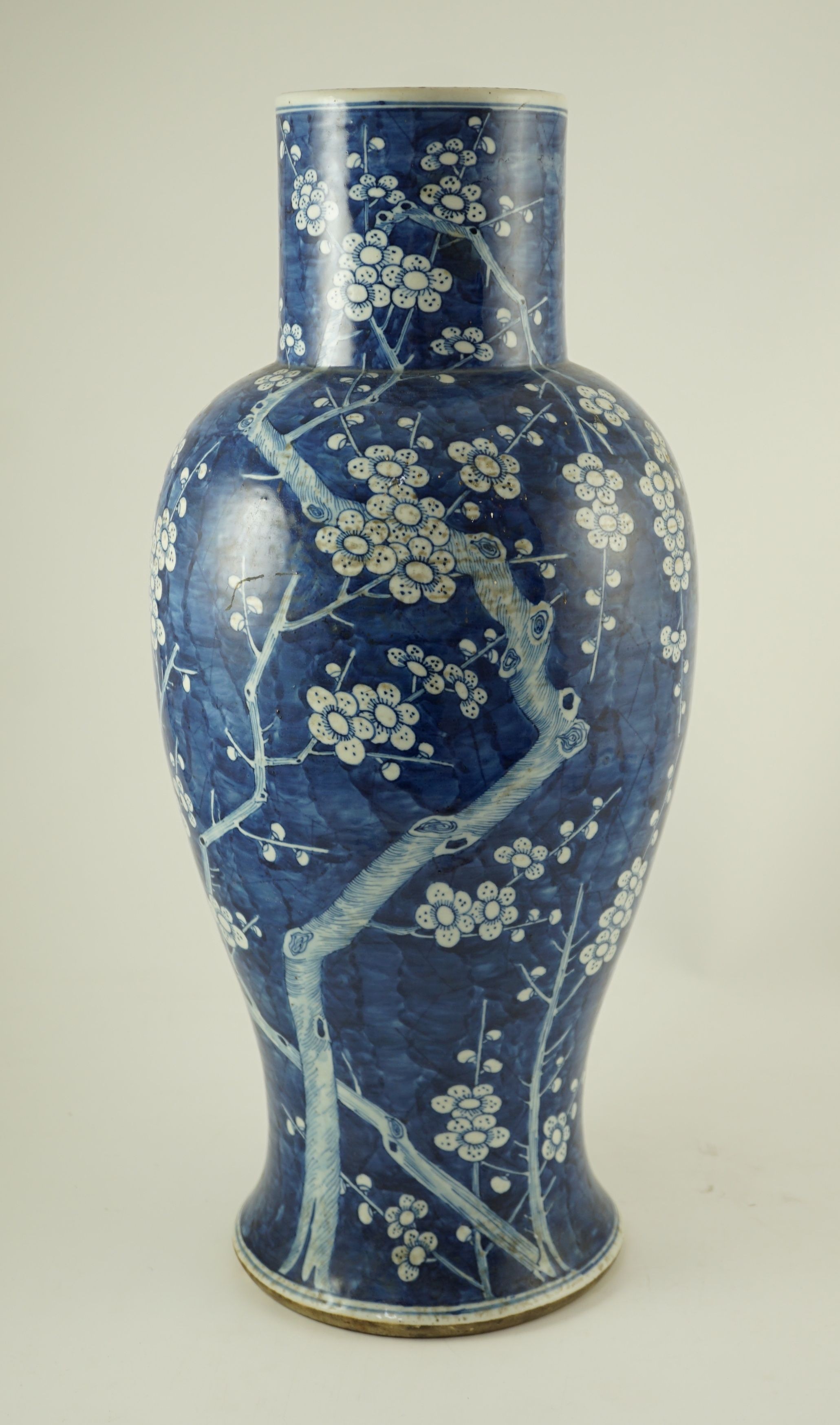 A large Chinese blue and white ‘prunus’ vase, 19th century, 55 cm high, drilled hole to base